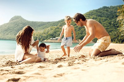 Family enjoying their time on one of the beaches in Hamilton Island
