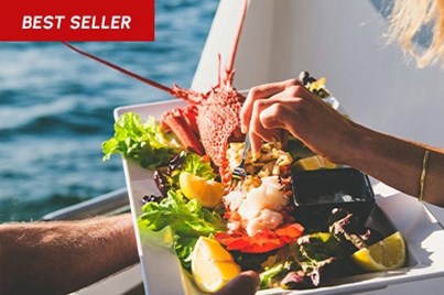 A seafood and seasonal fruit platter onboard a Tasmanian seafood lunch cruise experience