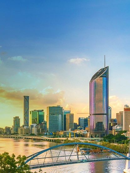 Panoramic view of the Brisbane city skyline during sunset