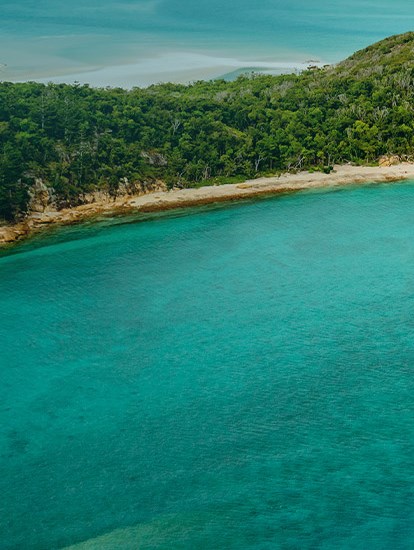 Aerial view of one of the pristine Whitsunday Islands