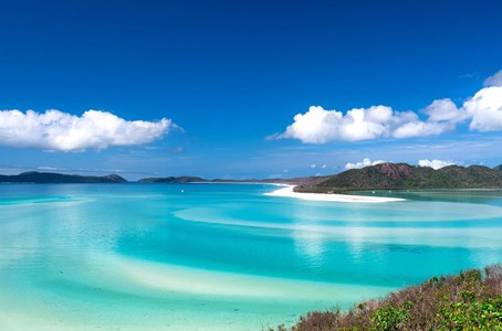 Guests taking it slow and basking in the sun on Whitehaven Beach