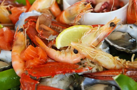 Freshly cooked lobsters served with noodle salad