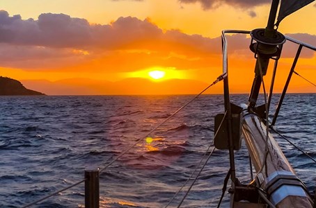Guests enjoying a glorious sunset aboard the Lady Enid Sunset cruise