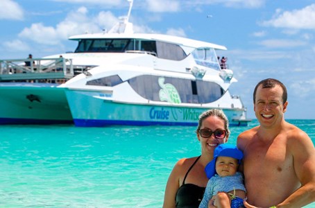 Family enjoying their time on one of the beaches in Hamilton Island