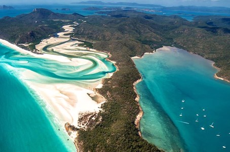 Family enjoying their time on one of the beaches in Hamilton Island