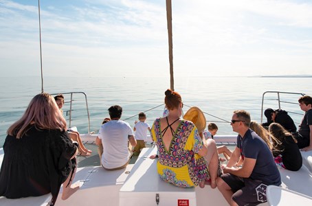 A luxury sailing yacht cruising along the waters off Moreton Island